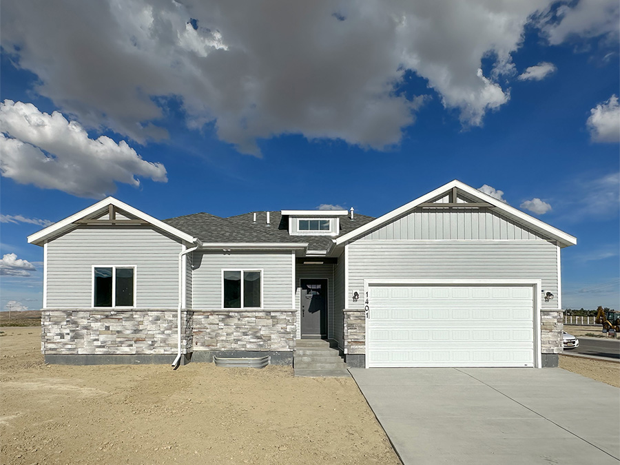 Stone and siding with complimentary grays on ranch floor plan The Edison at 1401 Kaye Way in Rock Springs WY
